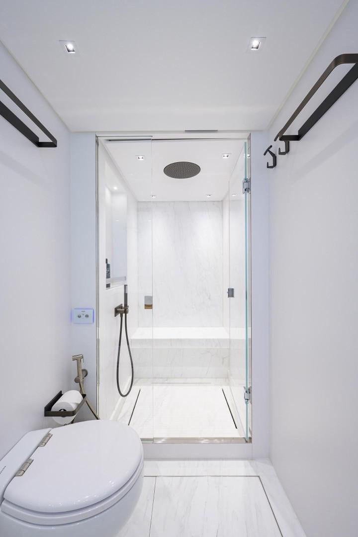 a bathroom with a shower unit aboard NINIPOP XL Yacht for Sale