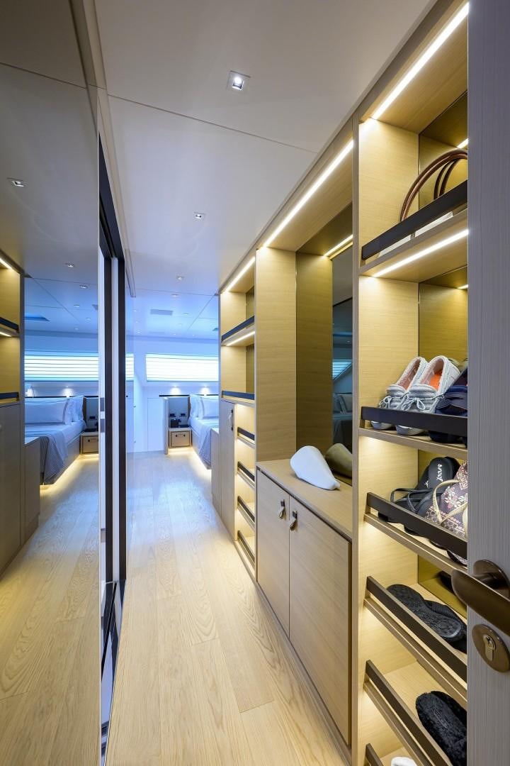 a room with a large mirror and a sink aboard NINIPOP XL Yacht for Sale
