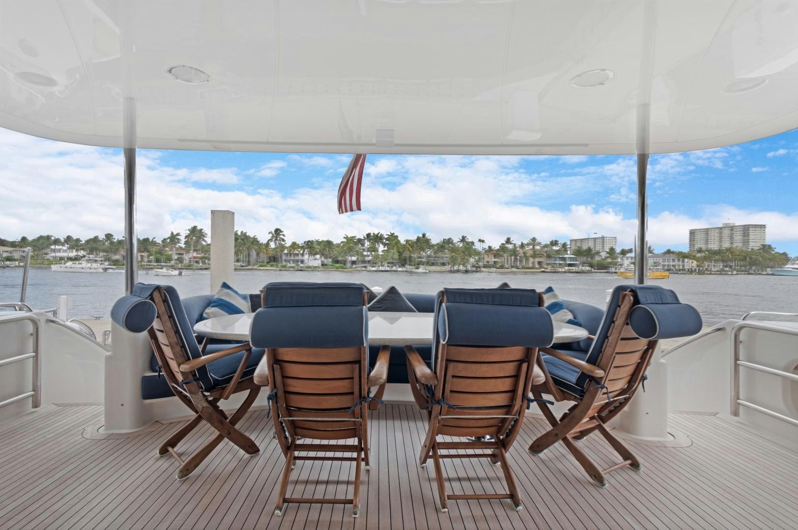 a group of chairs on a deck aboard BELLA GIORNATA Yacht for Sale