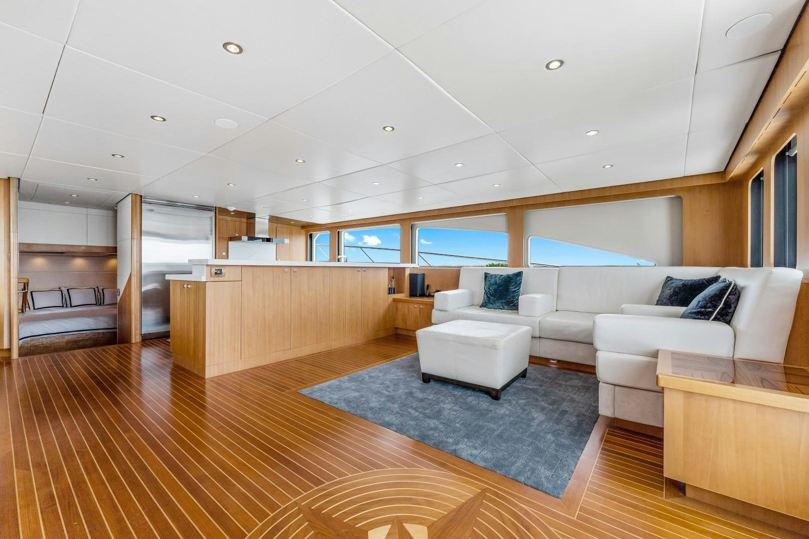 a modern looking living room aboard No Name Yacht for Sale