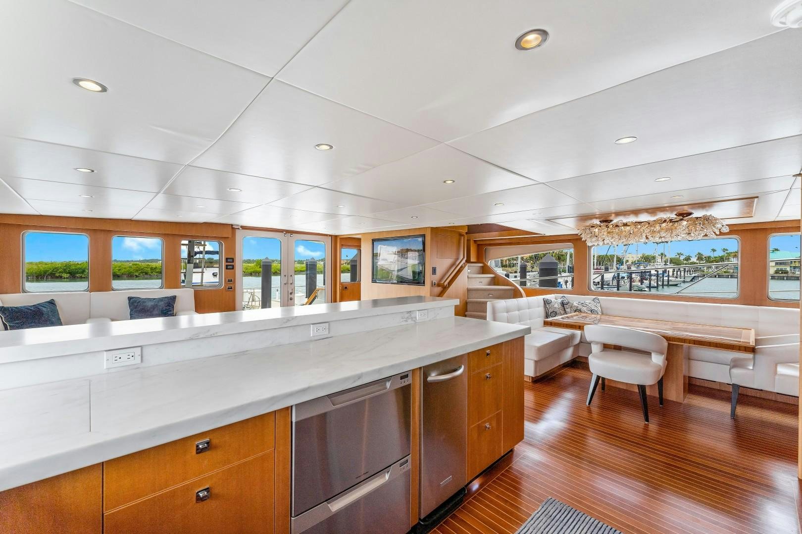 a large kitchen with a large island aboard No Name Yacht for Sale