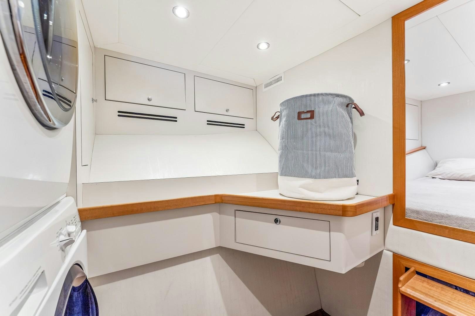 a bathroom with a sink and a mirror aboard No Name Yacht for Sale