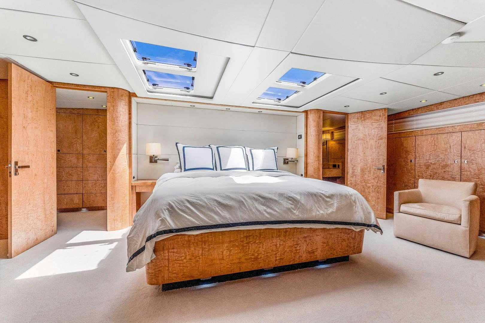 a large bed in a room aboard No Name Yacht for Sale