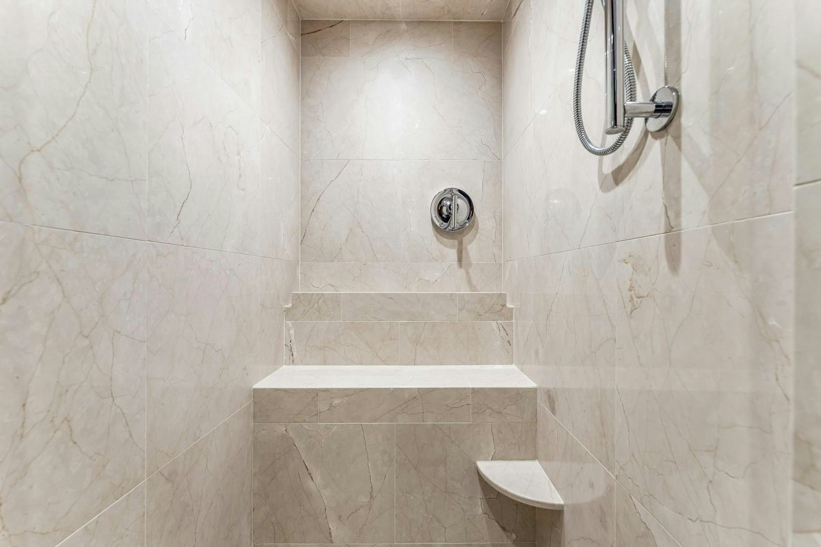 a bathroom with a shower aboard No Name Yacht for Sale