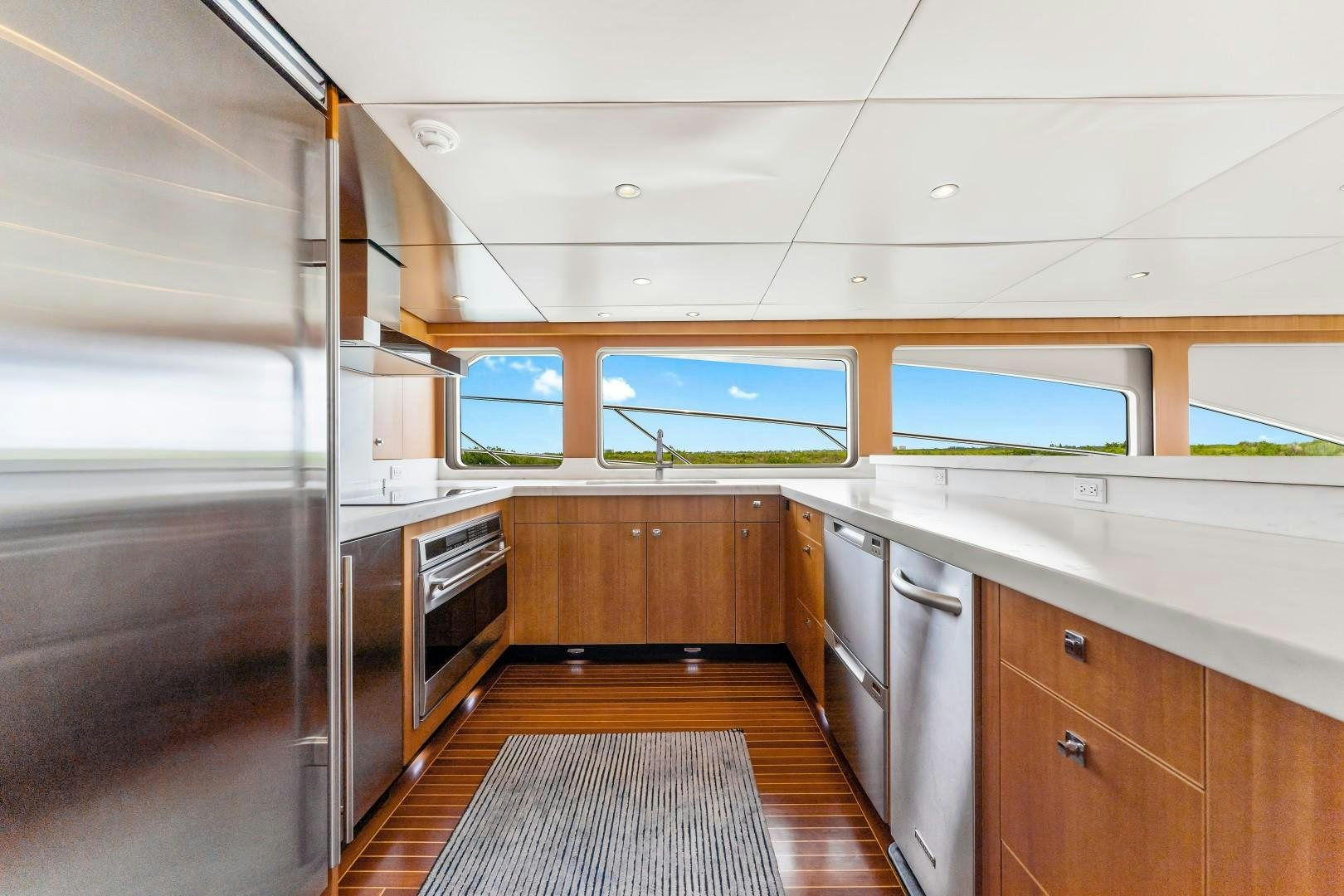 a kitchen with a large window aboard No Name Yacht for Sale