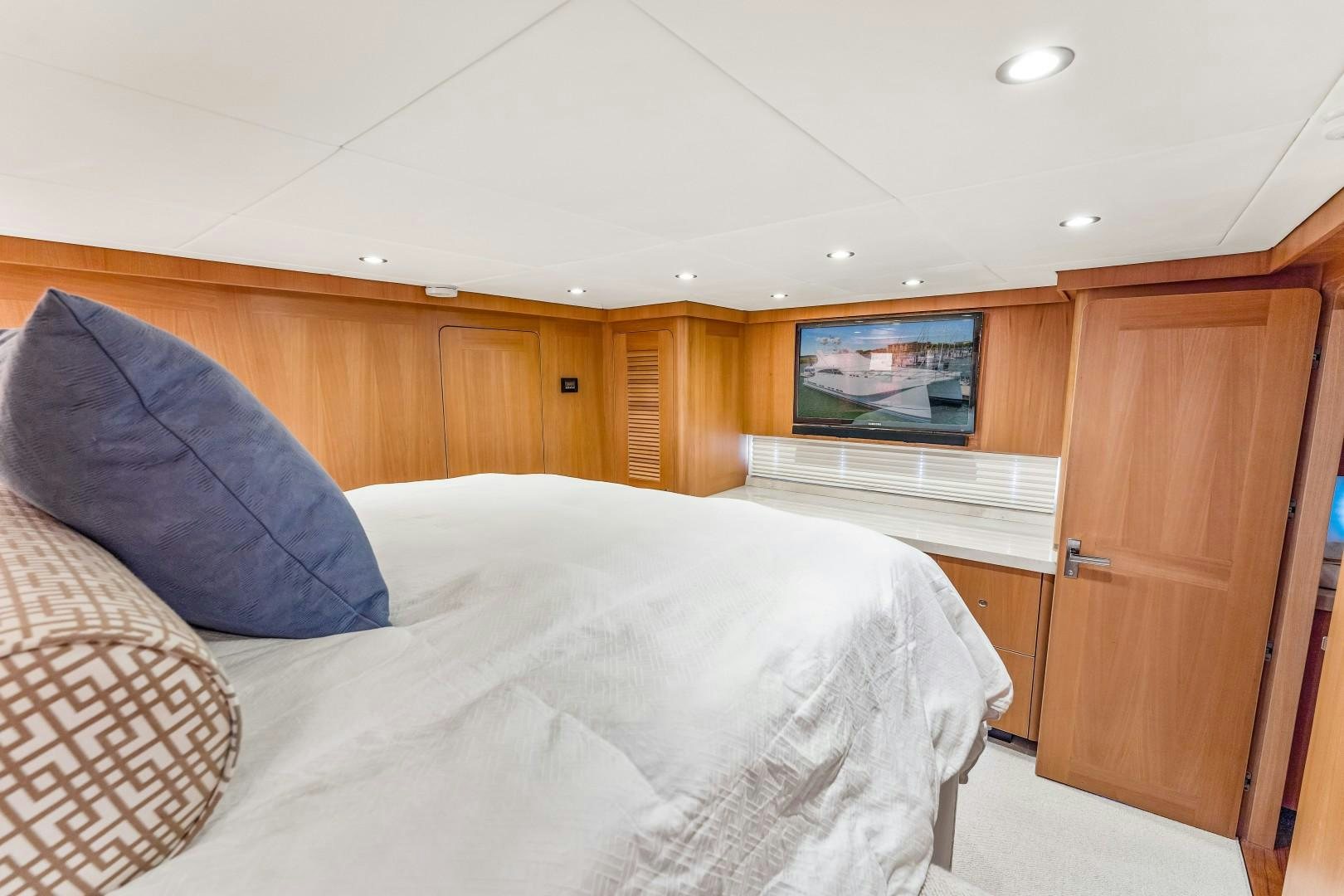 a bed in a room aboard No Name Yacht for Sale
