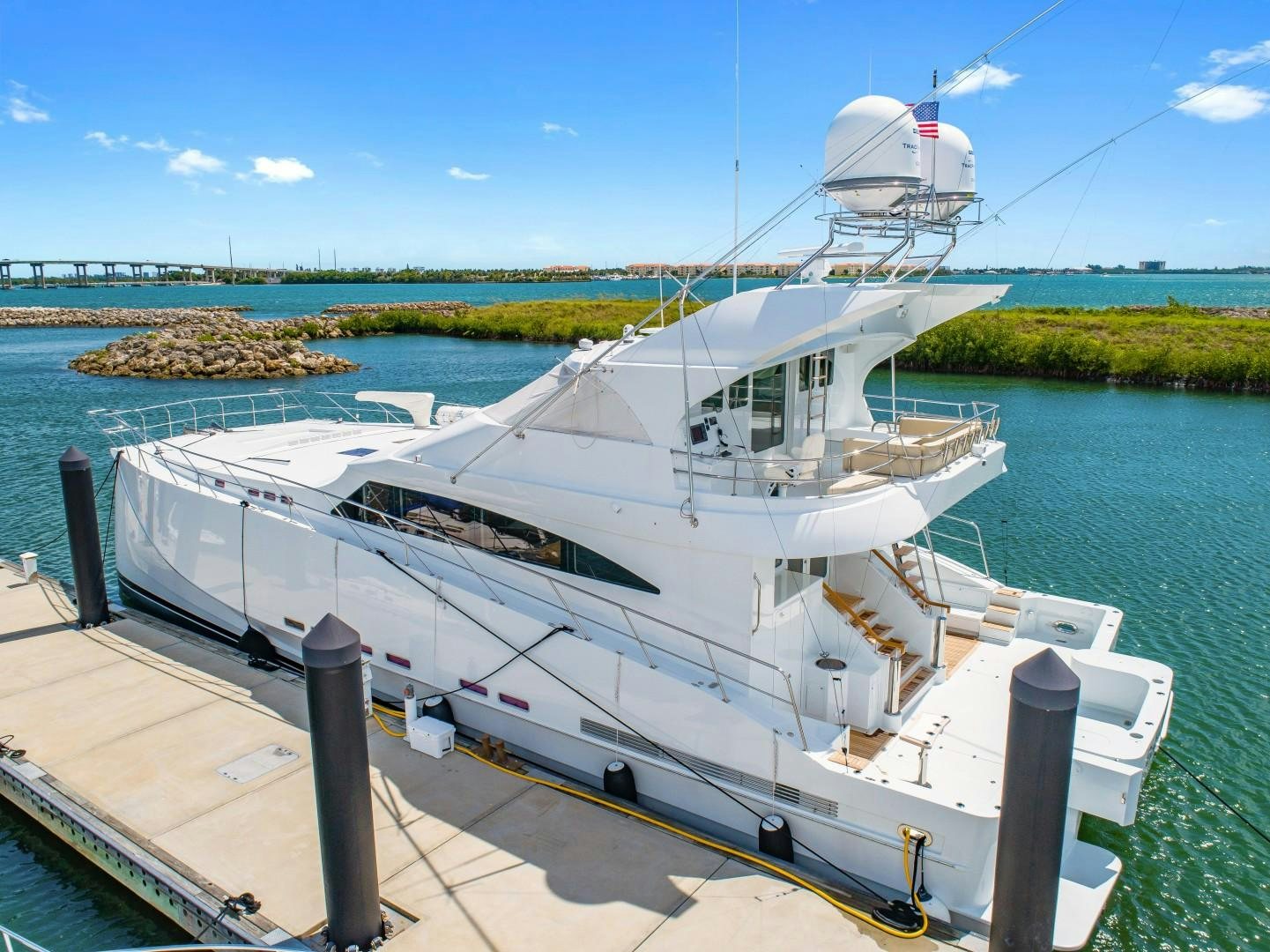 a white boat docked aboard No Name Yacht for Sale