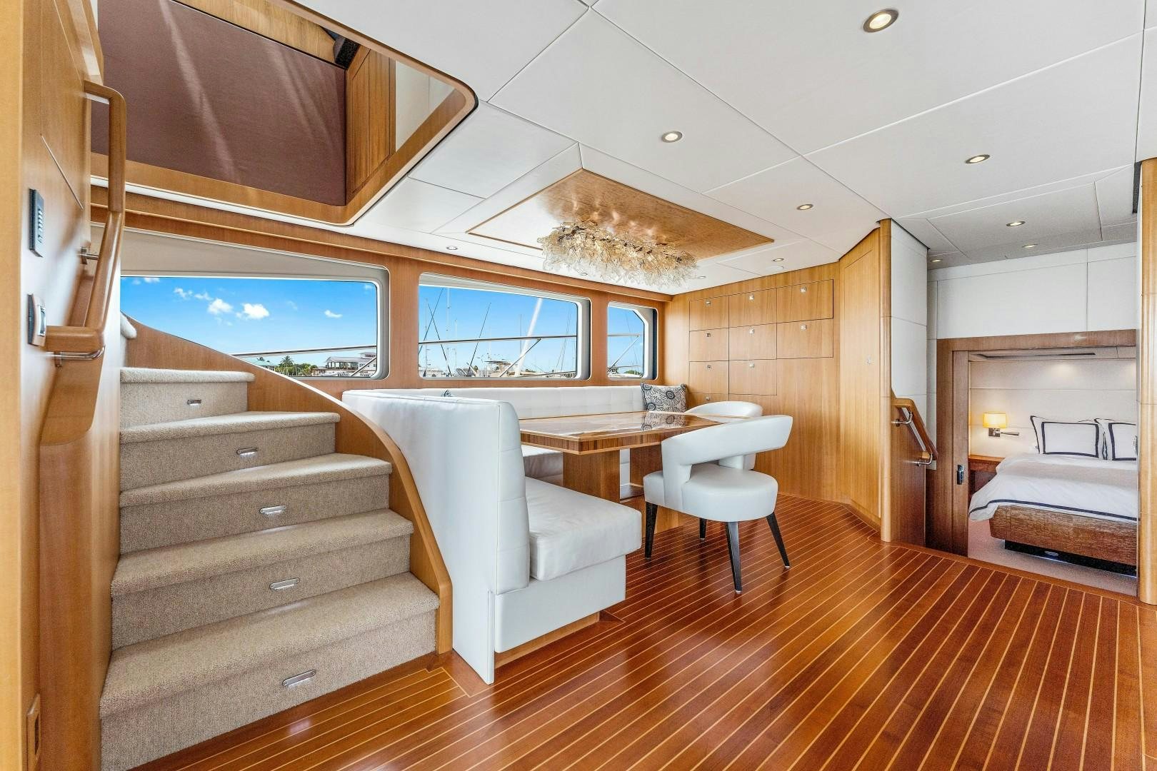 a room with a bed and a couch aboard No Name Yacht for Sale