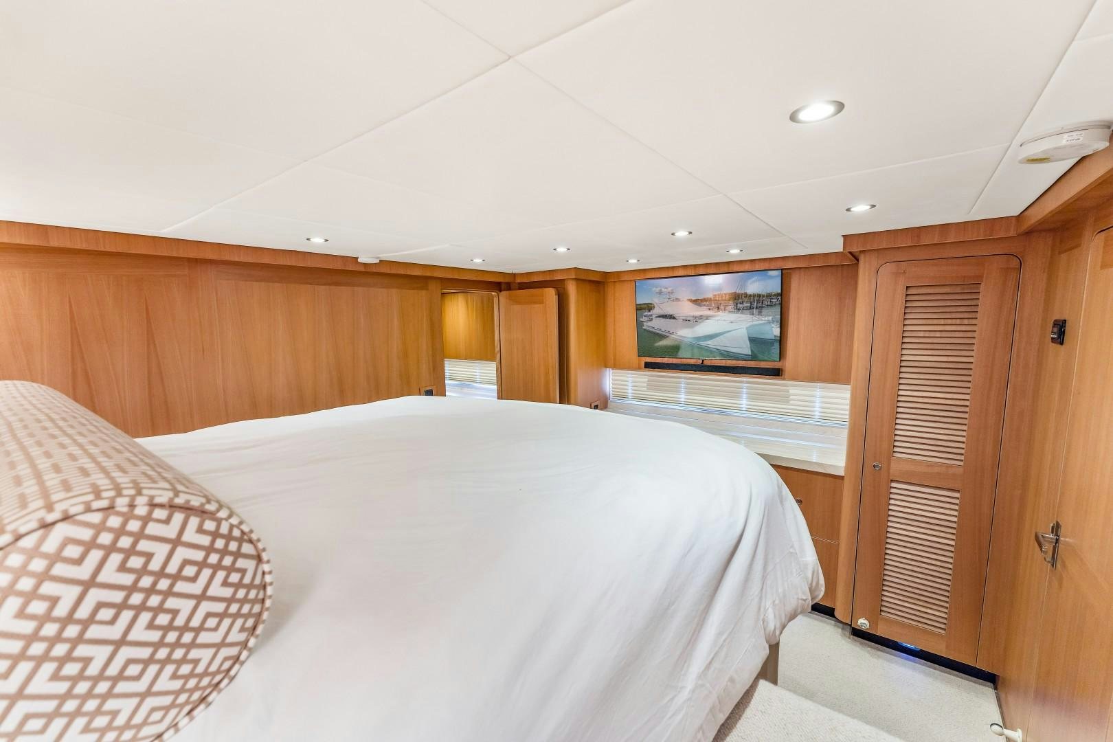 a bed in a room aboard No Name Yacht for Sale