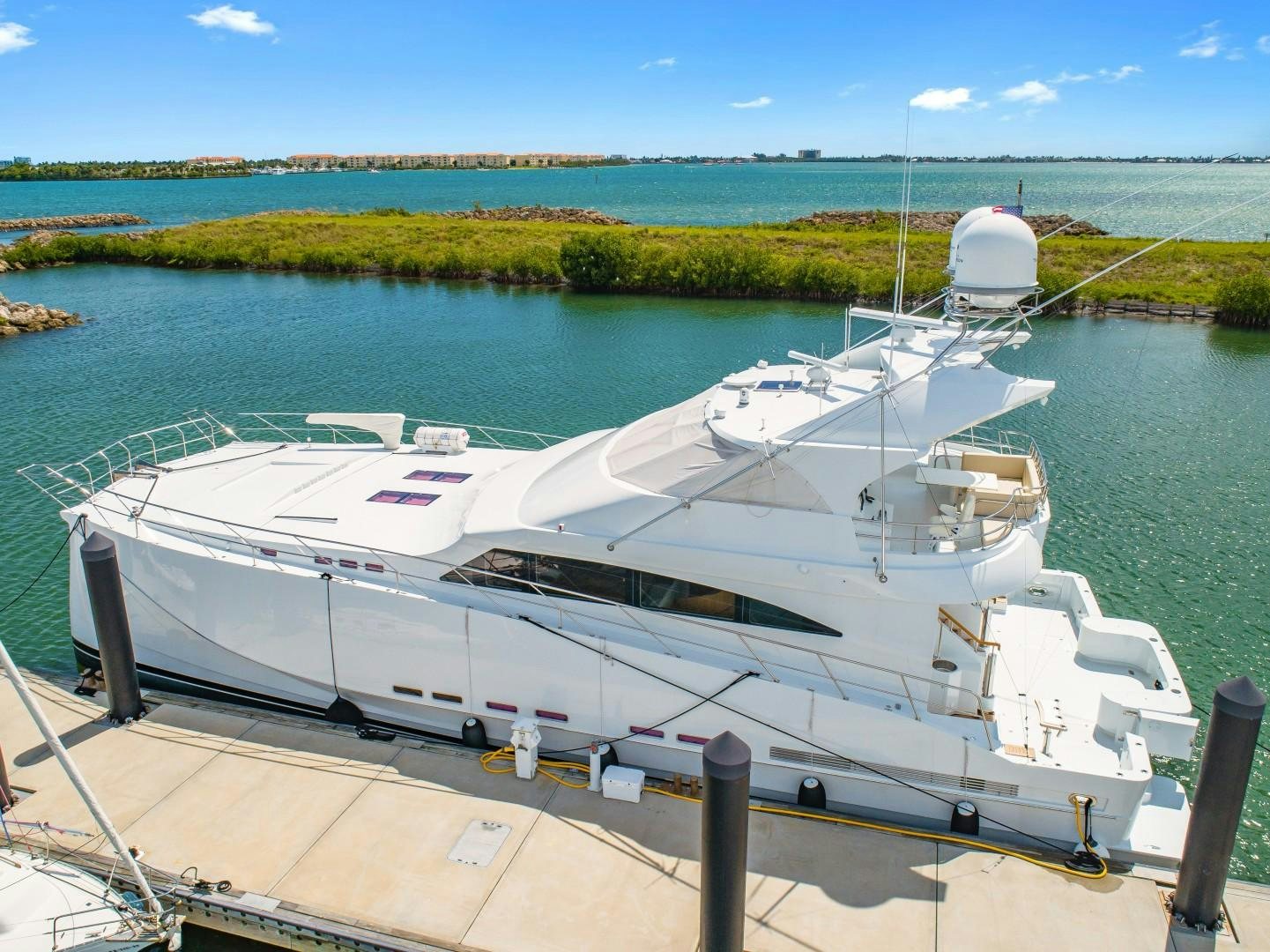 a white boat in a body of water aboard No Name Yacht for Sale