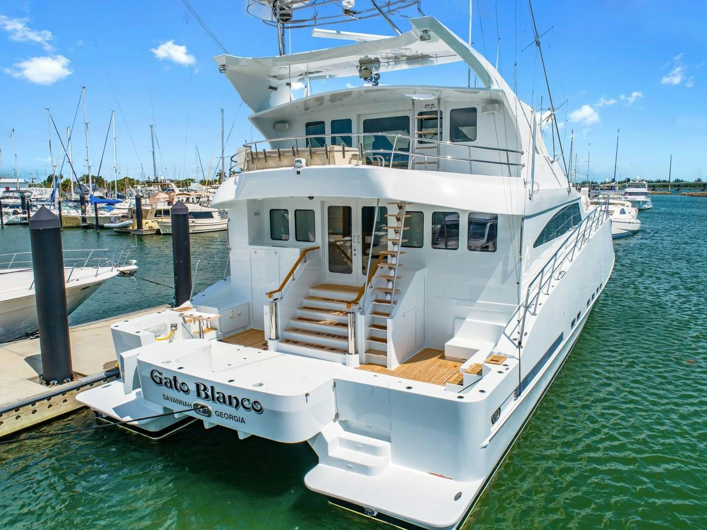 a boat docked at a pier aboard No Name Yacht for Sale