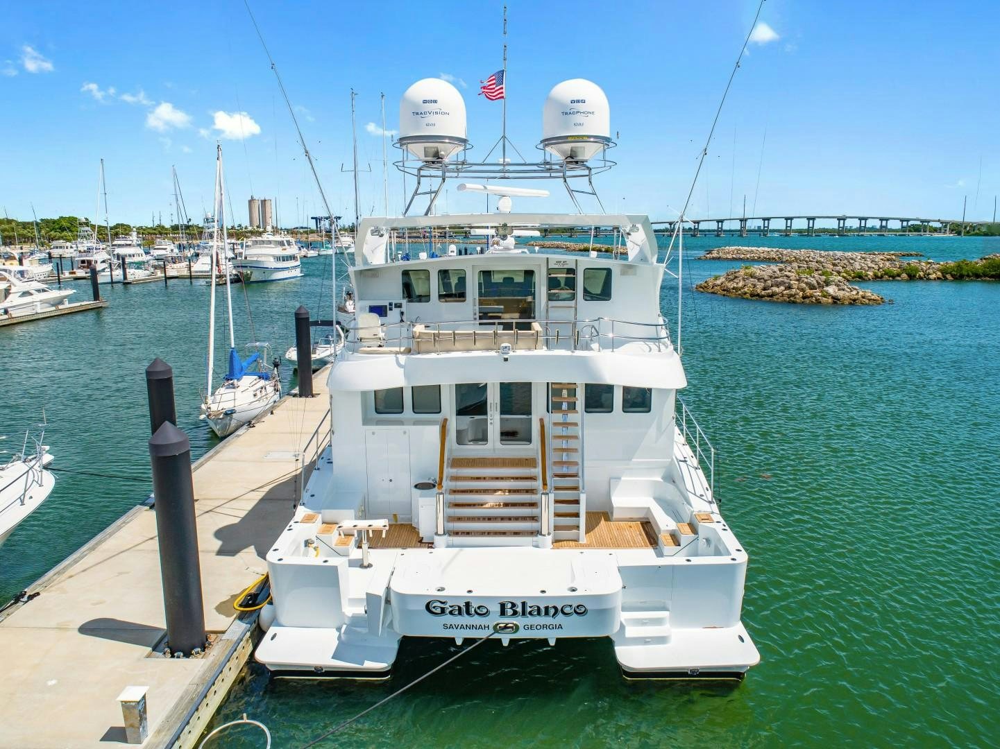 a boat docked at a pier aboard No Name Yacht for Sale