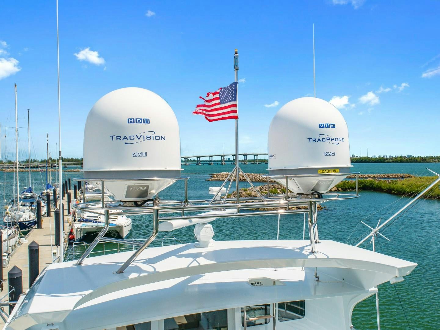 a large white ship with flags on it aboard No Name Yacht for Sale