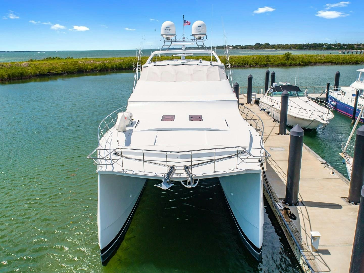 a boat docked at a pier aboard No Name Yacht for Sale