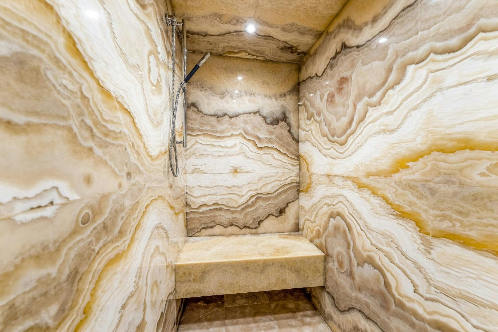 a room with a bed and a wall aboard No Name Yacht for Sale