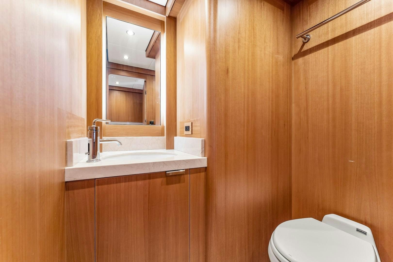 a bathroom with a toilet and sink aboard No Name Yacht for Sale