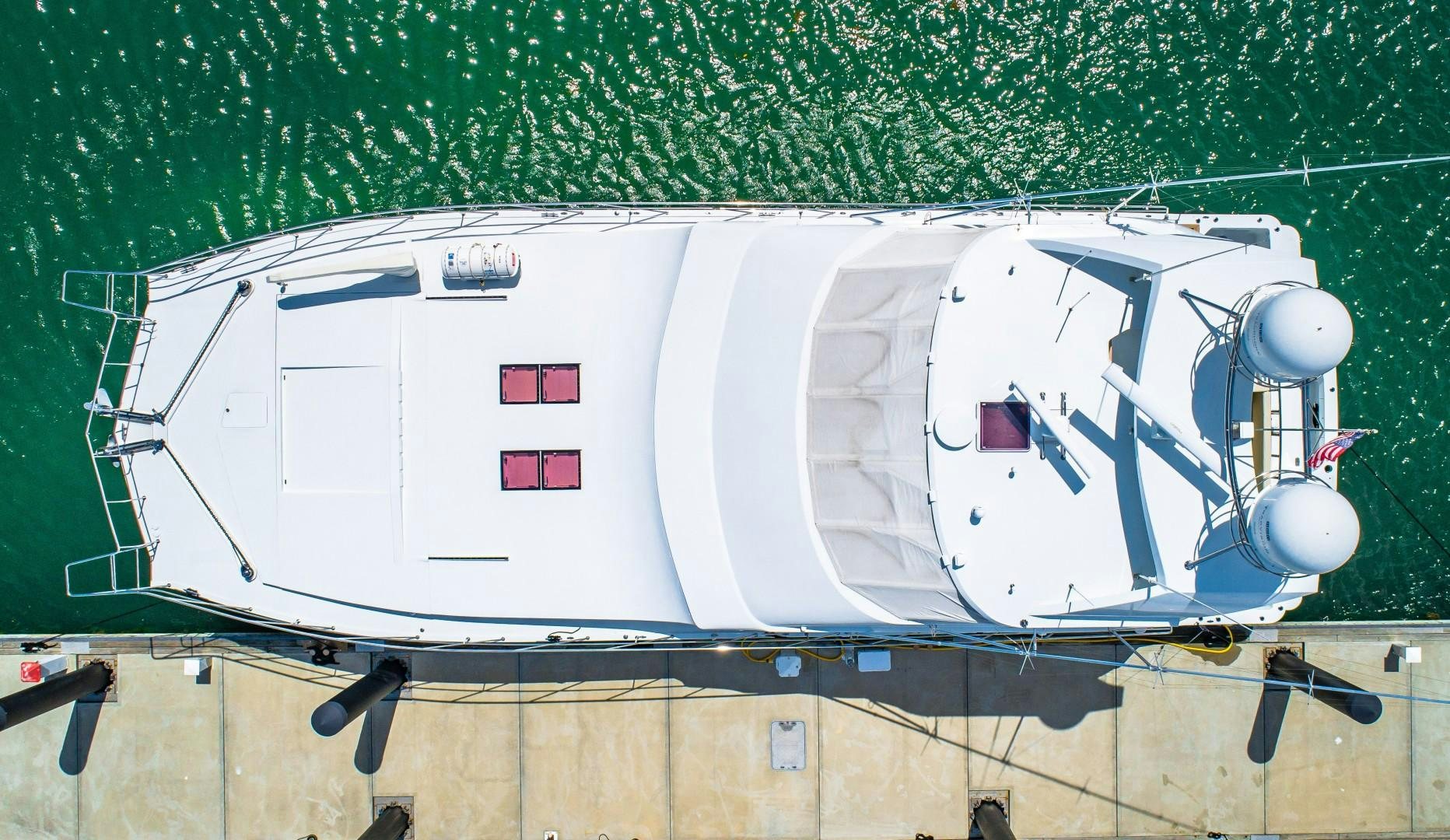 a white train car on a track aboard No Name Yacht for Sale