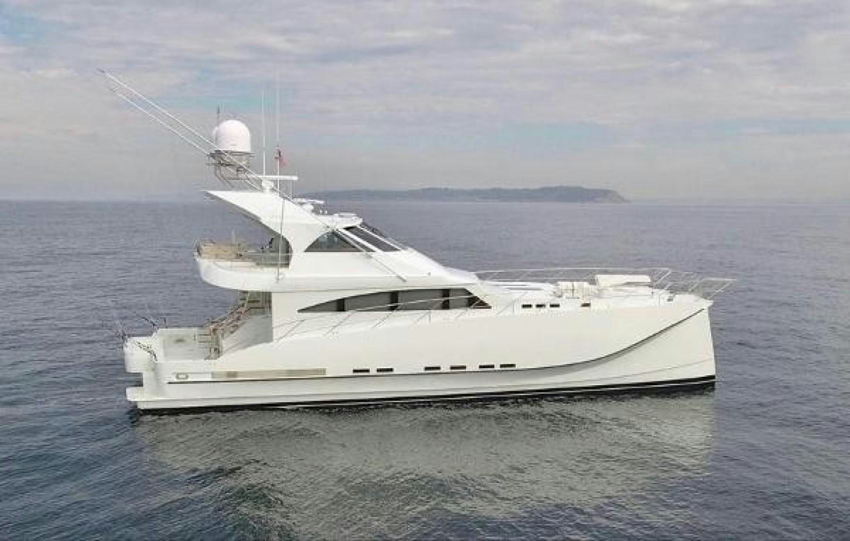 a white boat in the water aboard No Name Yacht for Sale