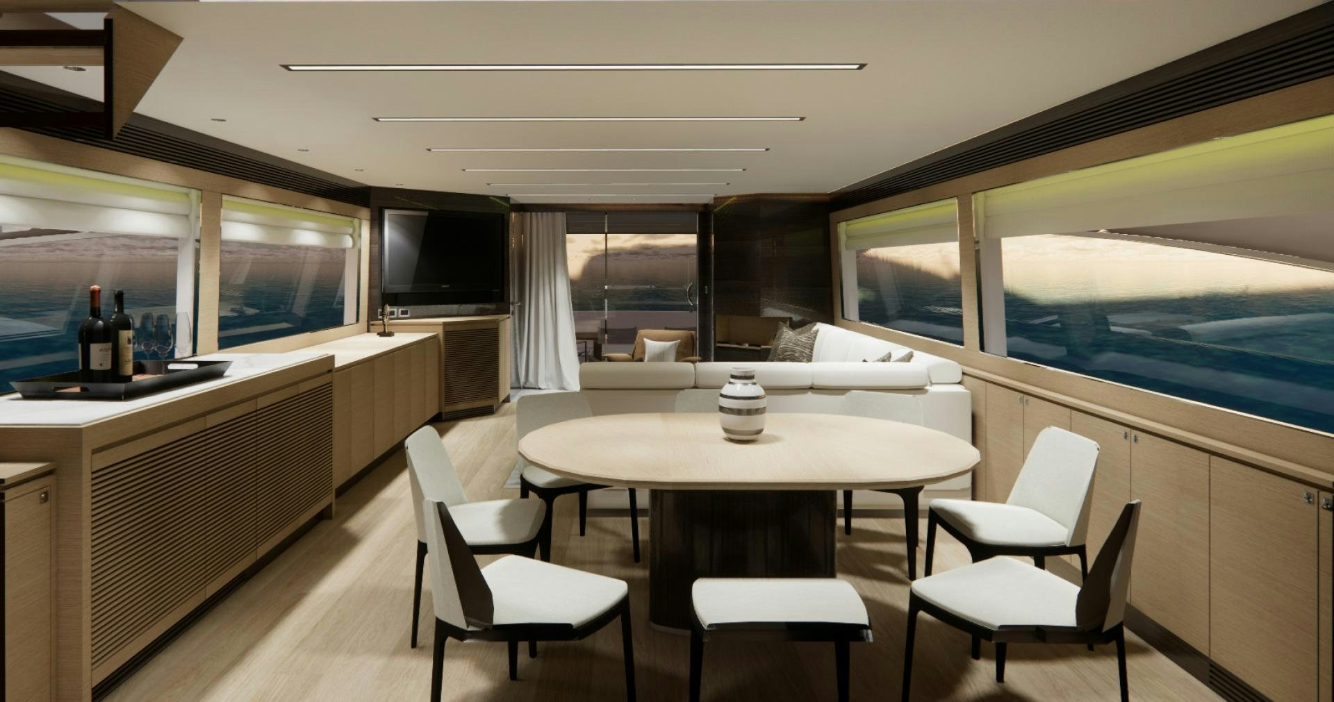 a room with a table and chairs aboard E90 922 Yacht for Sale
