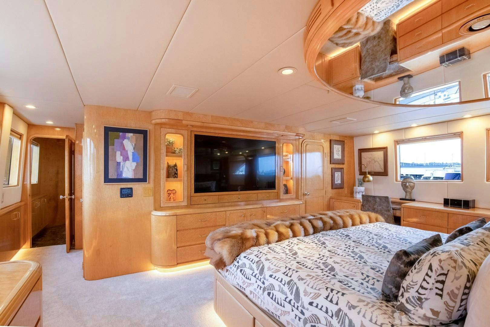 a bedroom with a large bed aboard SINBAD Yacht for Sale