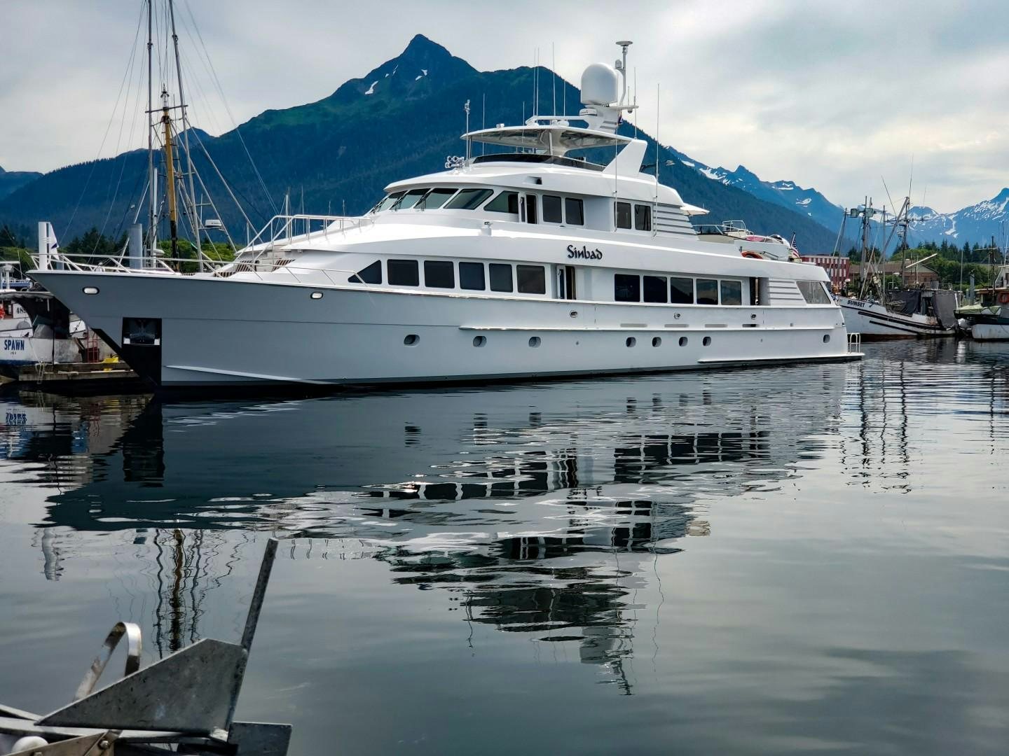 a boat docked at a pier aboard SINBAD Yacht for Sale