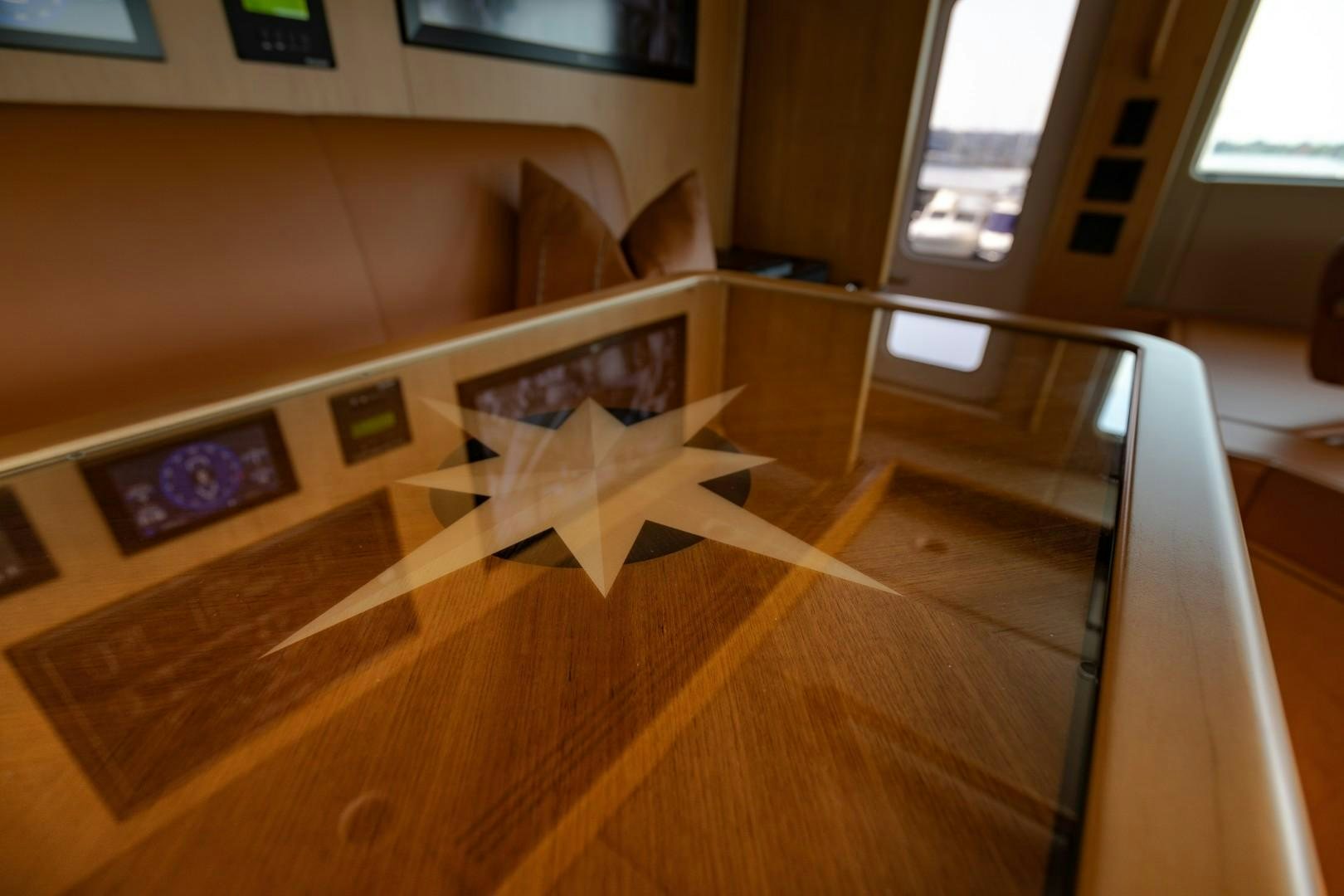 a cardboard box on a wood floor aboard SINBAD Yacht for Sale