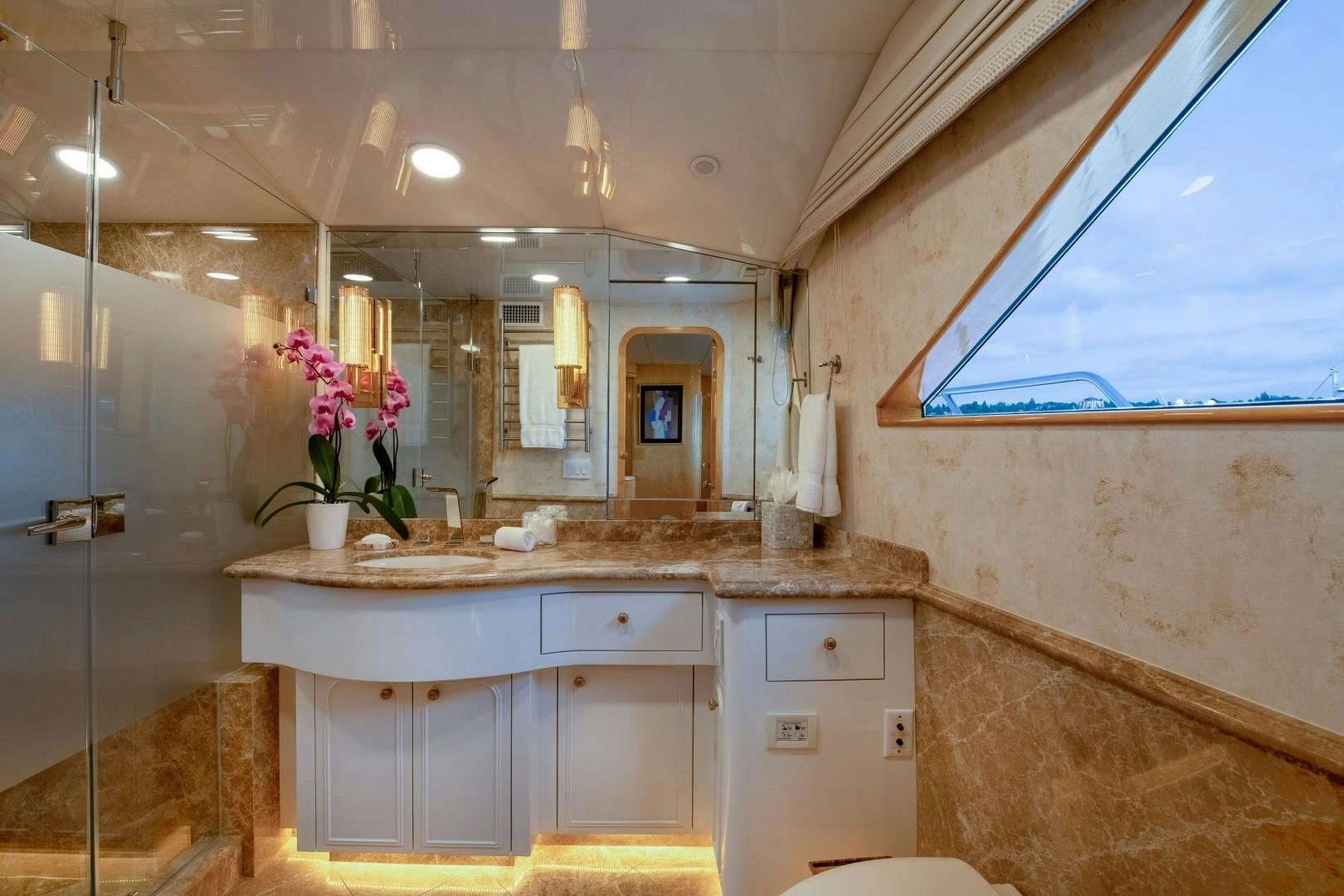 a bathroom with a sink and a mirror aboard SINBAD Yacht for Sale