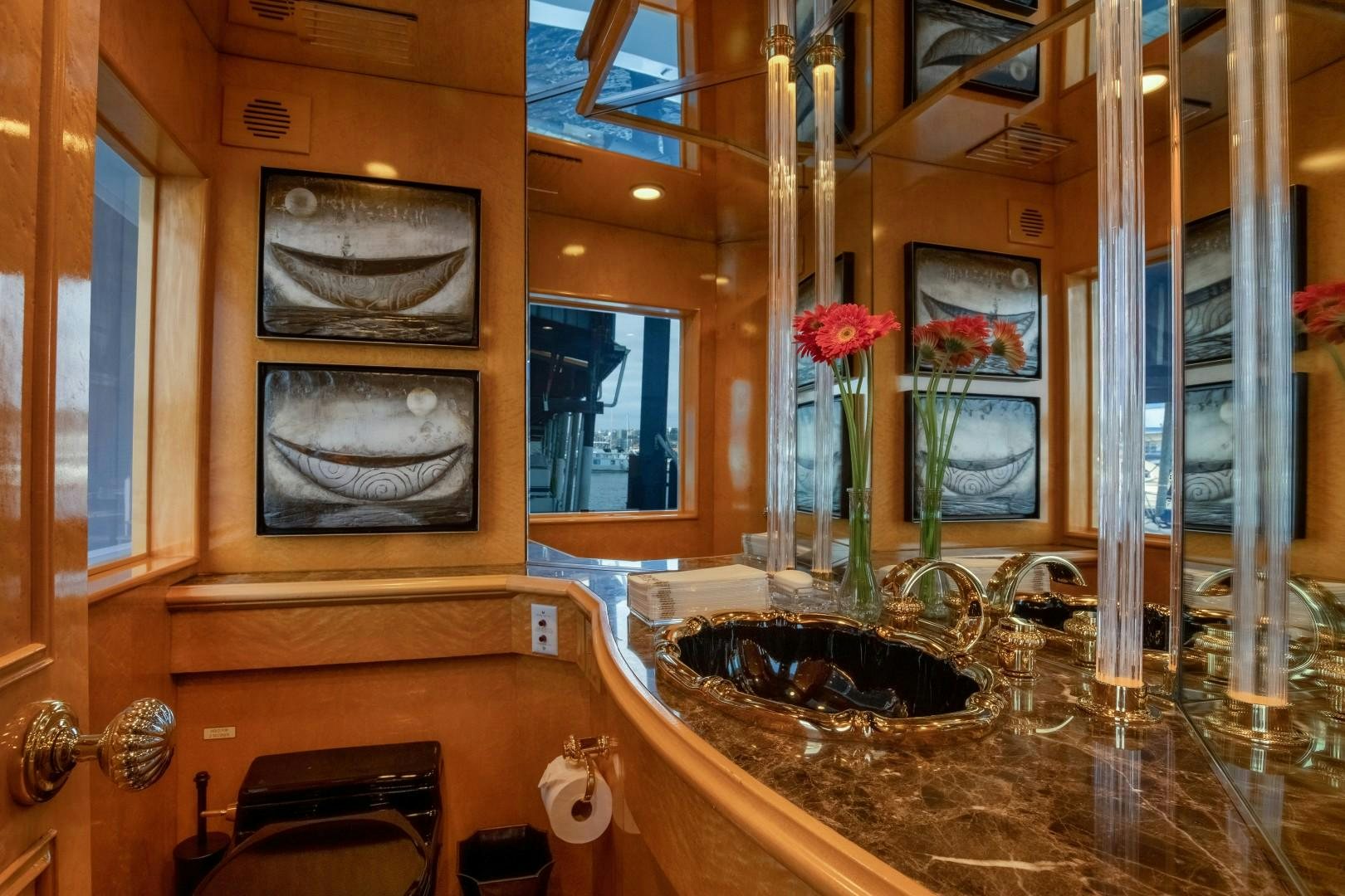 a bathroom with a sink and a mirror aboard SINBAD Yacht for Sale