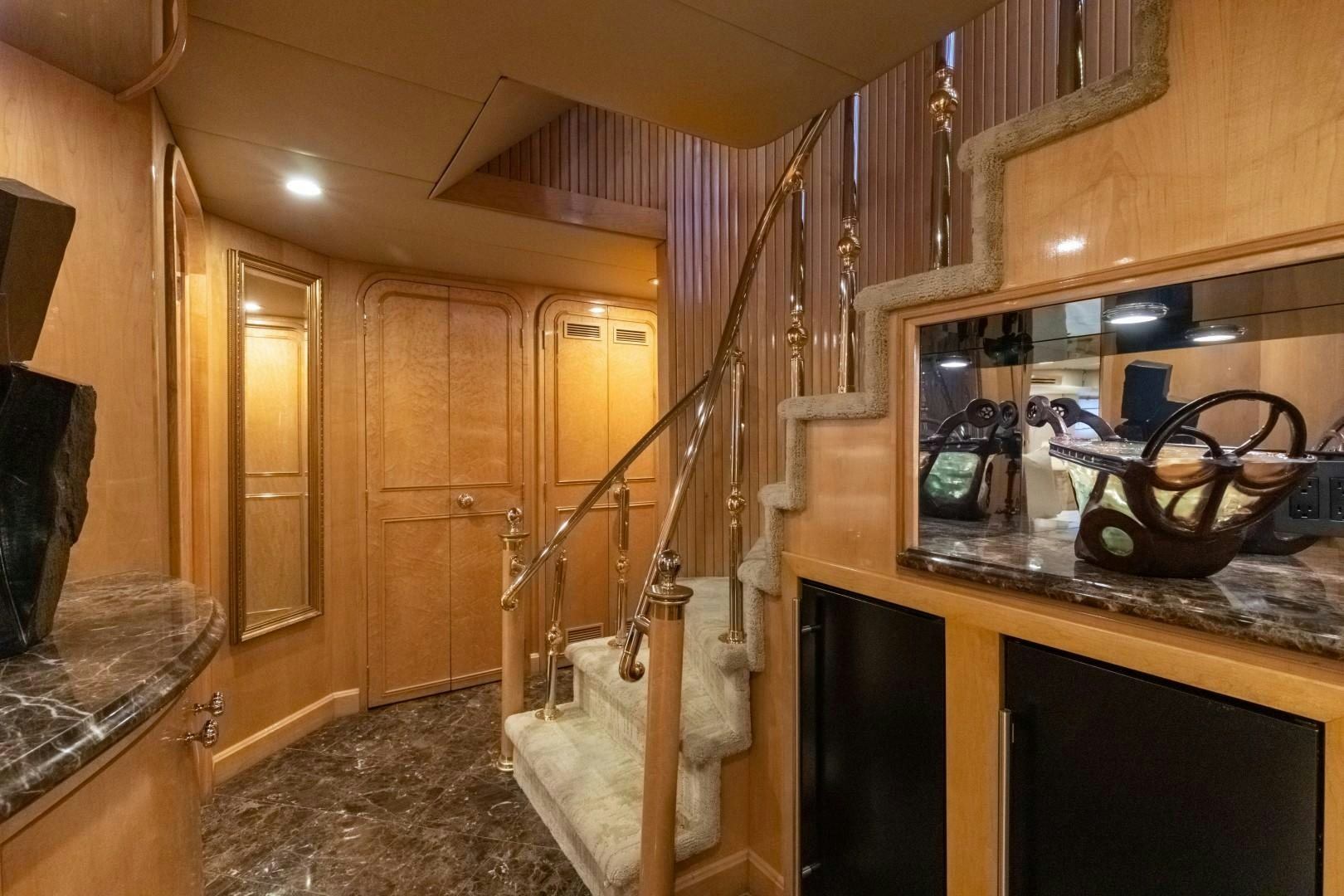 a bathroom with wooden walls aboard SINBAD Yacht for Sale