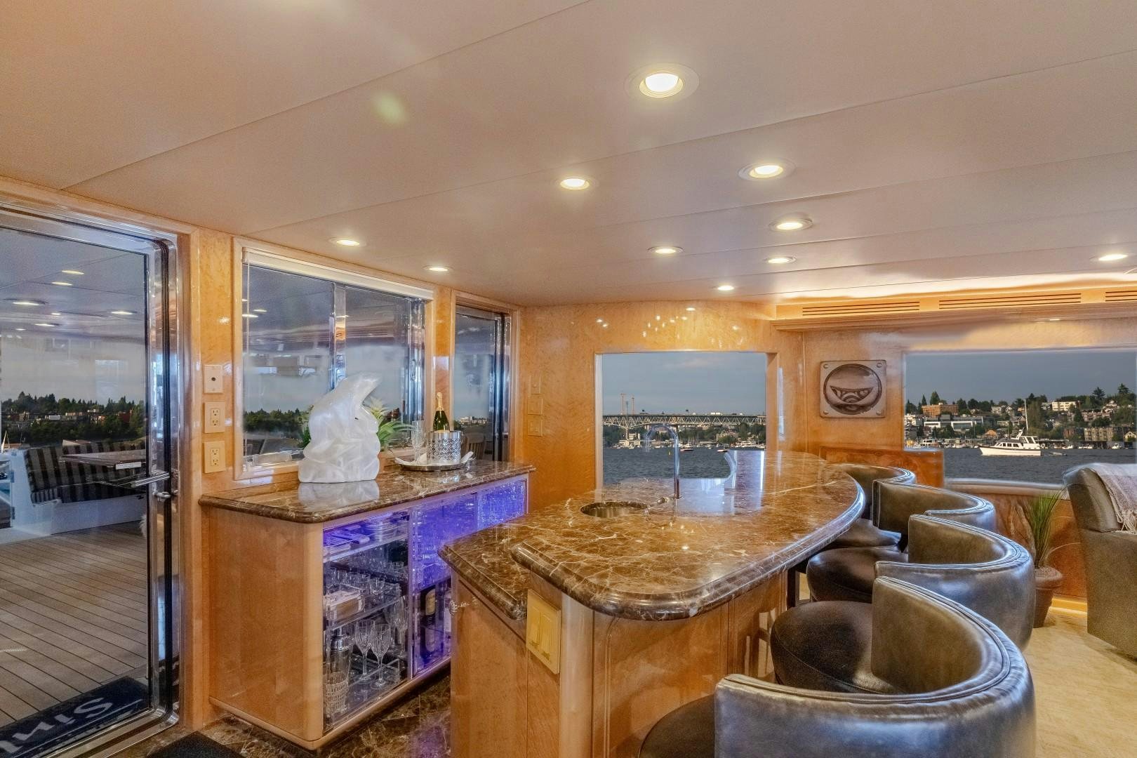 a room with a table and chairs aboard SINBAD Yacht for Sale