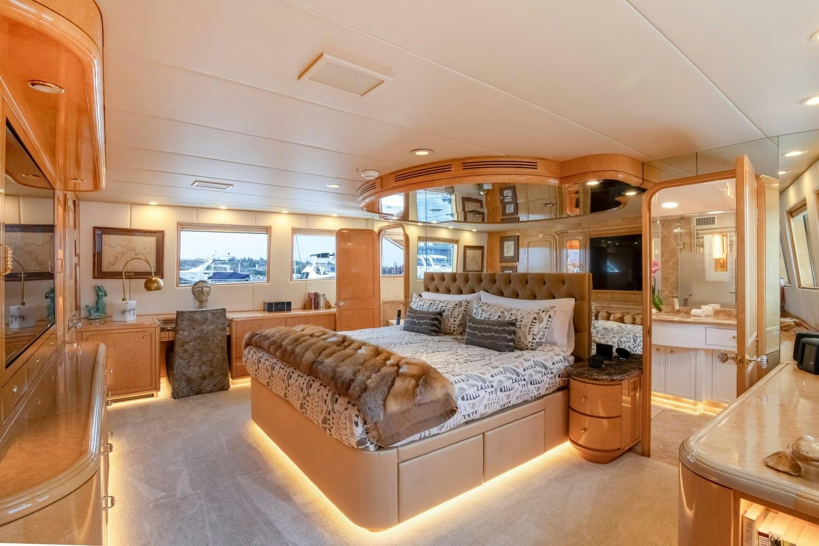a large bedroom with a large bed aboard SINBAD Yacht for Sale