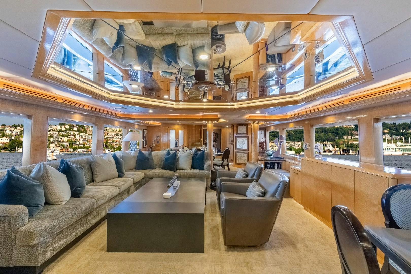 a room with a couch and a table aboard SINBAD Yacht for Sale