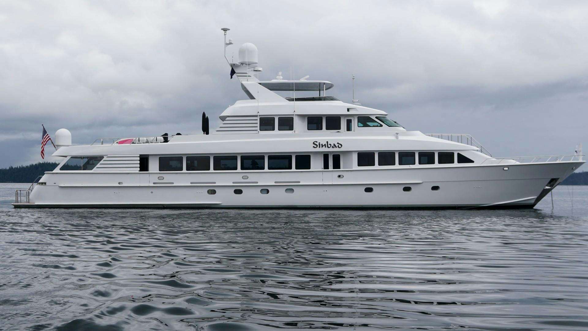 a large white boat in the water aboard SINBAD Yacht for Sale