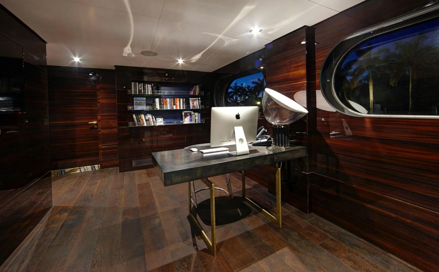 a room with a desk and a computer aboard HIGHLANDER Yacht for Sale