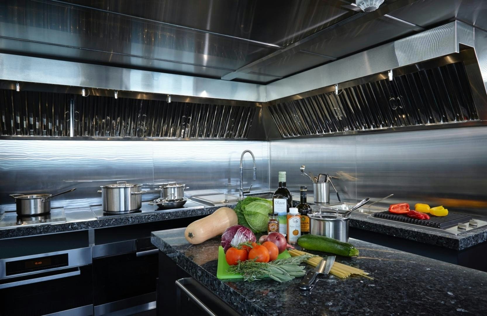 a kitchen with a bunch of food aboard HIGHLANDER Yacht for Sale