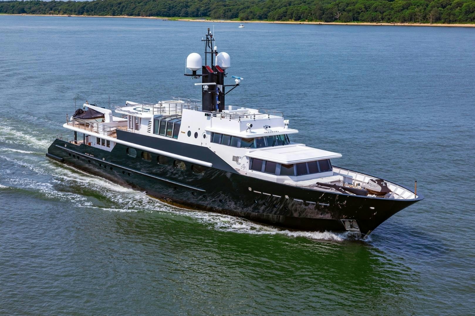 a large ship on the water aboard HIGHLANDER Yacht for Sale
