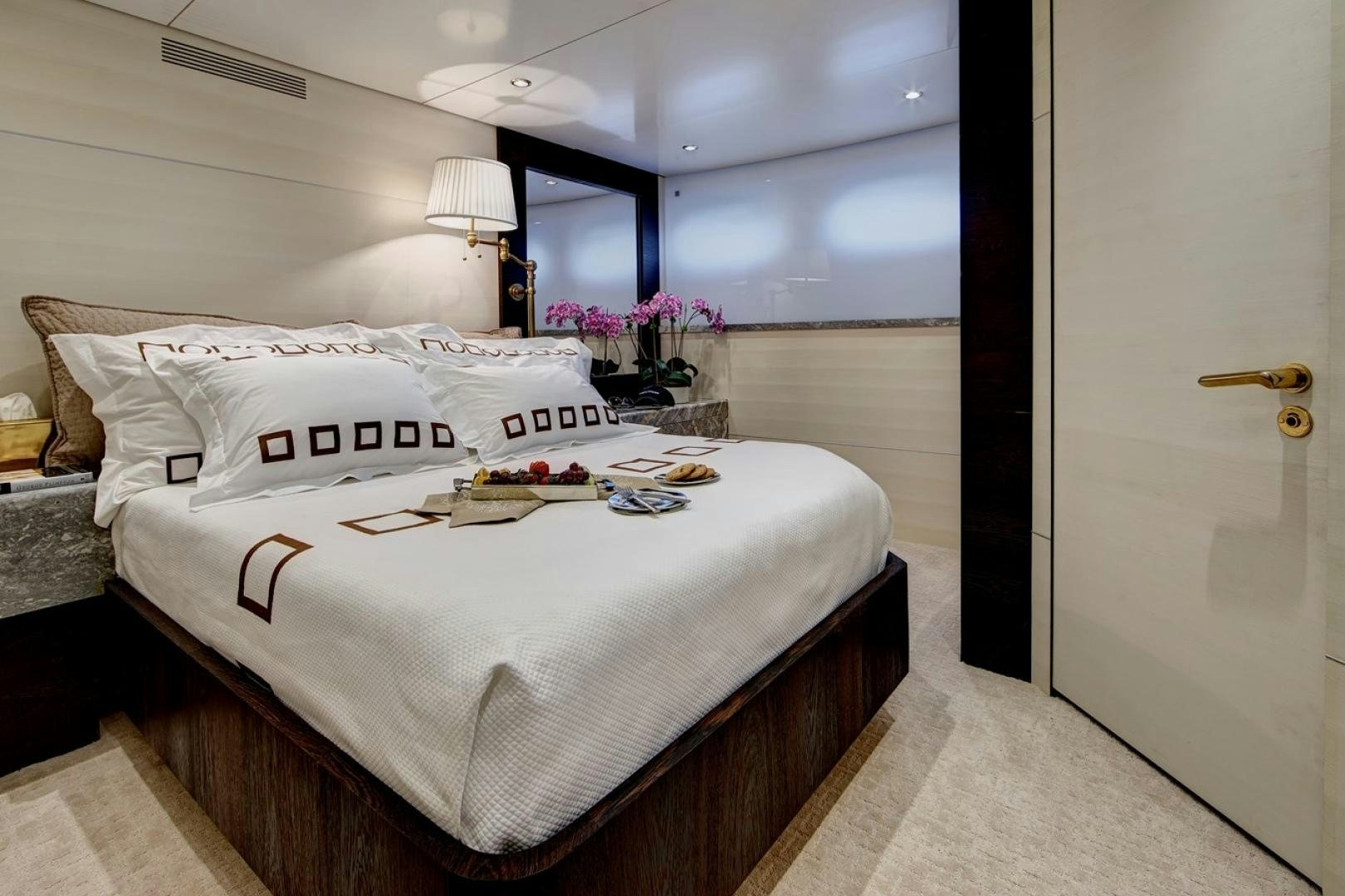 a bed with white sheets aboard HIGHLANDER Yacht for Sale