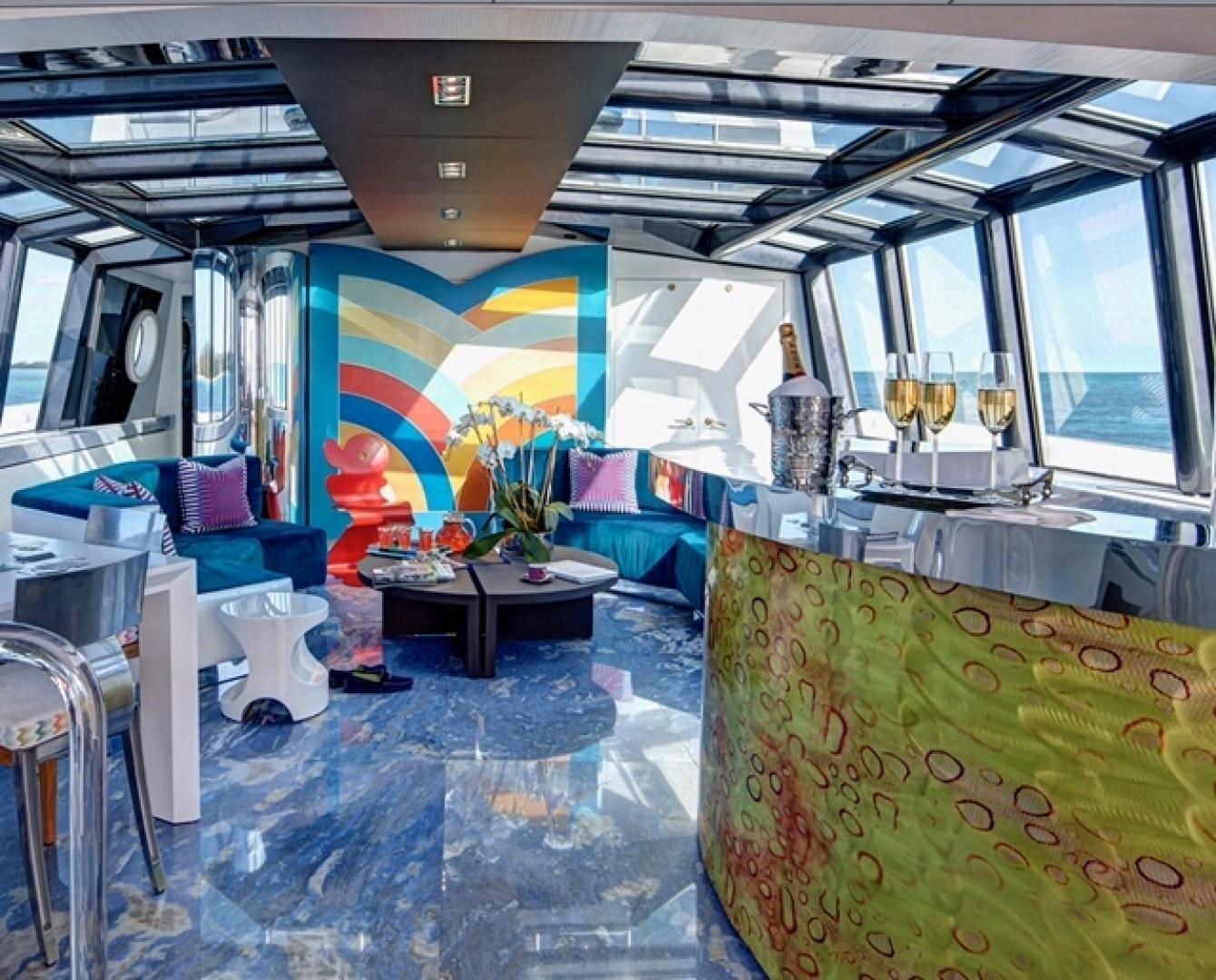 inside of a vehicle with a large painting on the wall aboard HIGHLANDER Yacht for Sale