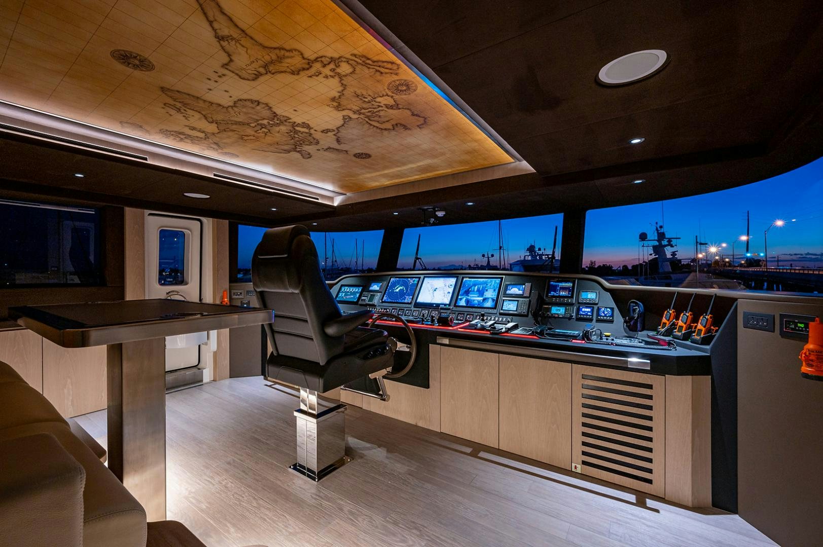 a room with a desk and computer aboard LIRA Yacht for Sale