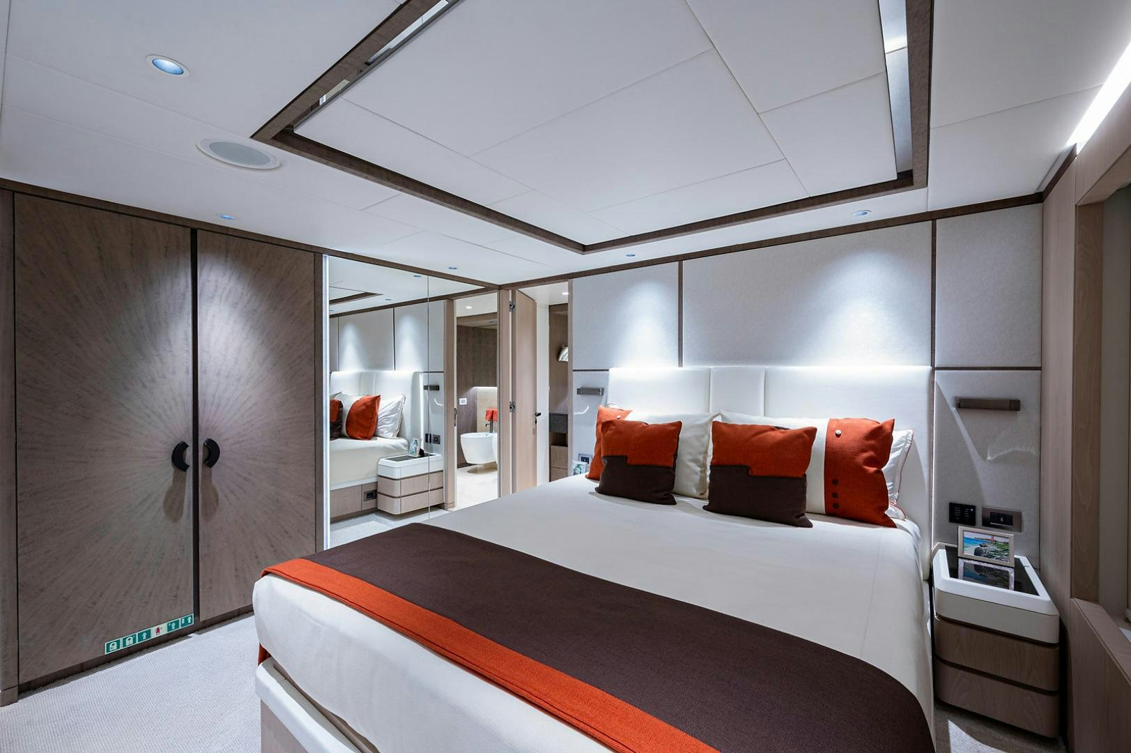 a bed in a room aboard LIRA Yacht for Sale