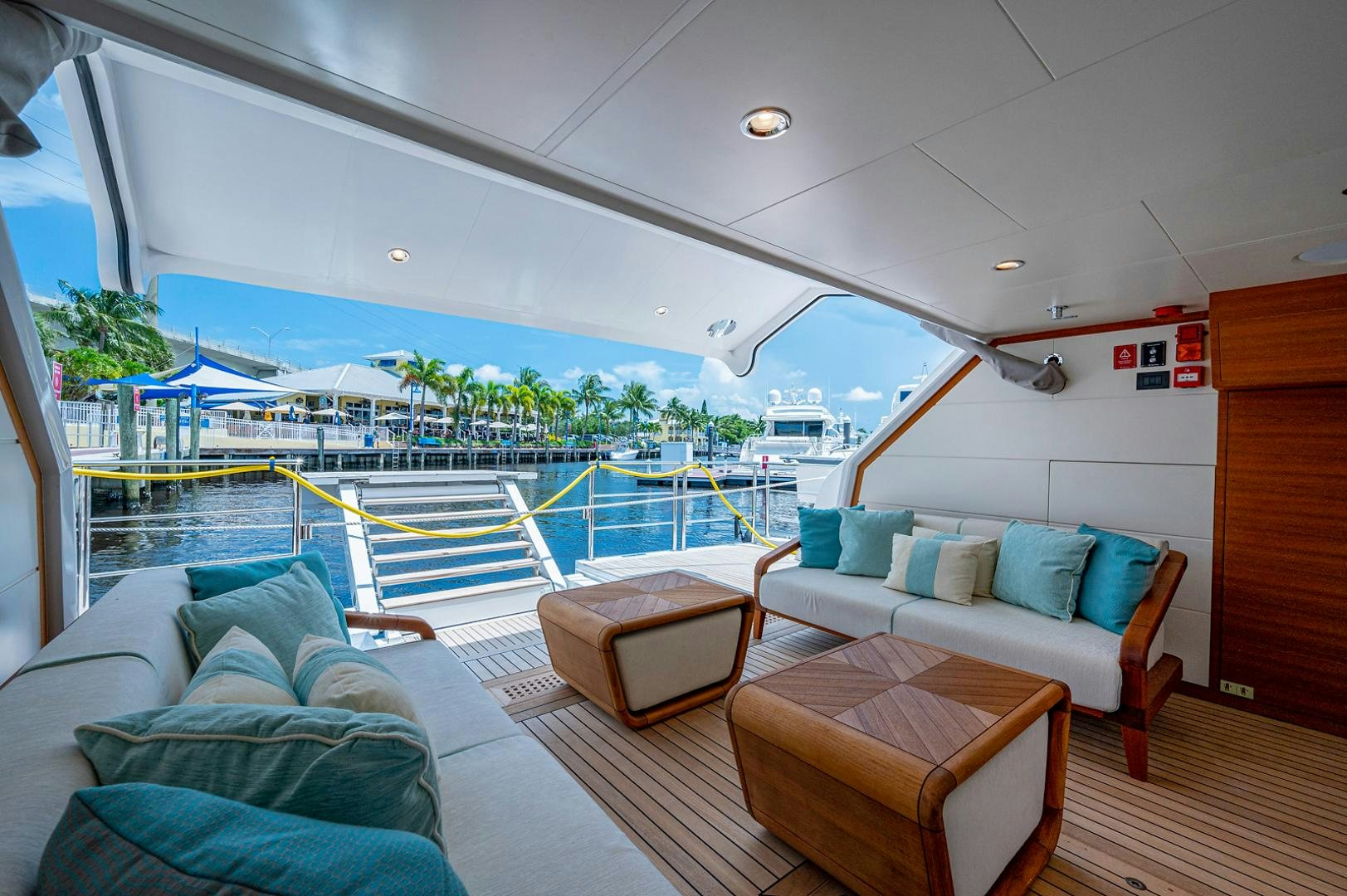 a large pool with a couch and a table aboard LIRA Yacht for Sale