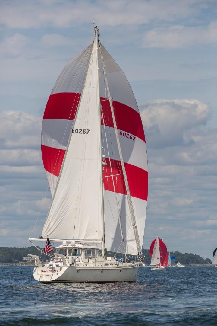 a sailboat on the water aboard DANCIN BARE V Yacht for Sale