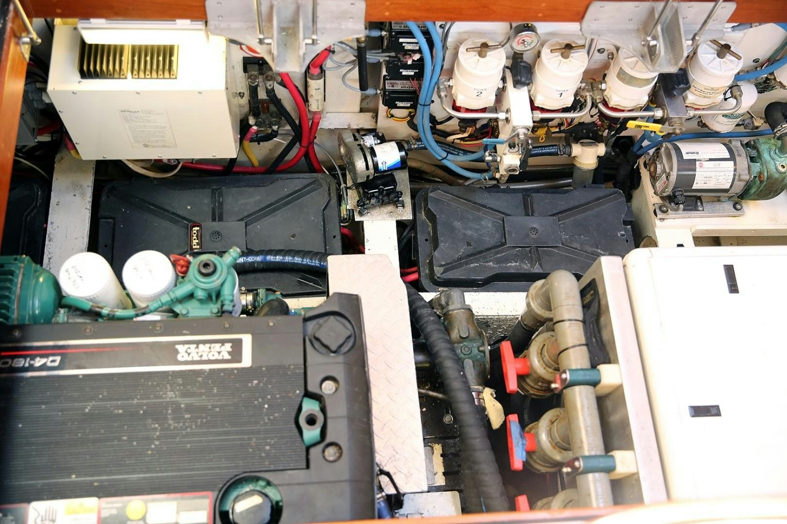 a close-up of a car engine aboard DANCIN BARE V Yacht for Sale