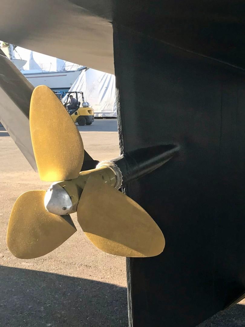 a close-up of a propeller aboard DANCIN BARE V Yacht for Sale