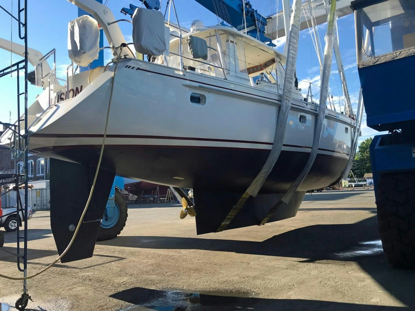 a boat on a trailer aboard DANCIN BARE V Yacht for Sale