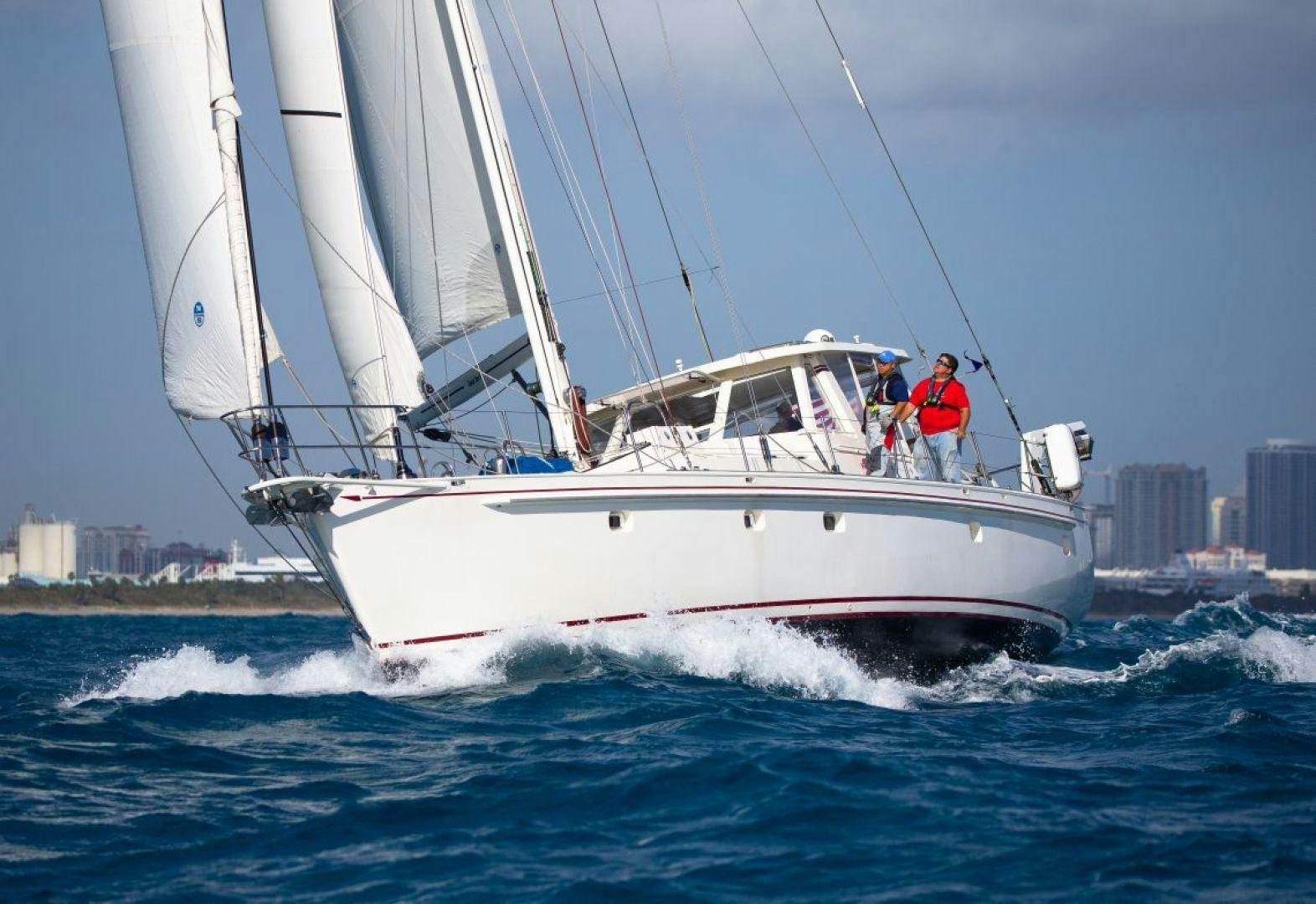 a boat on the water aboard DANCIN BARE V Yacht for Sale