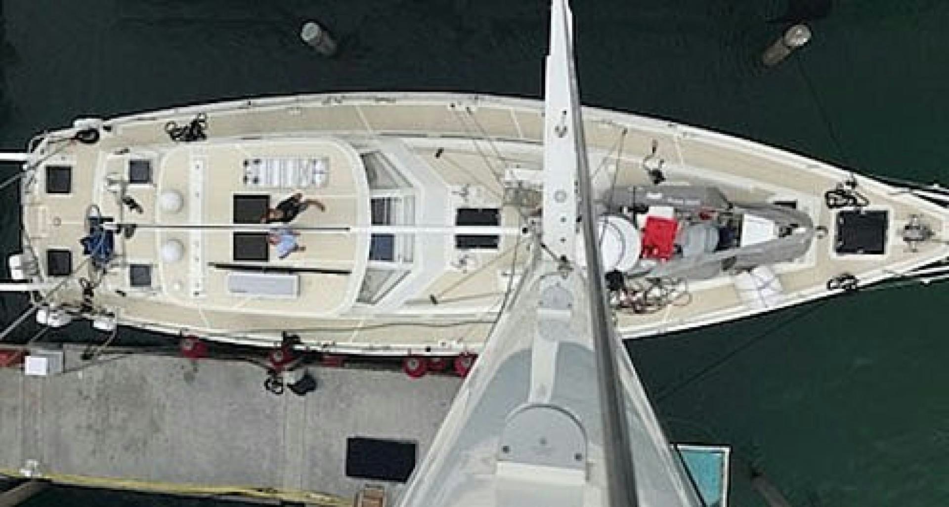 a large white ship aboard DANCIN BARE V Yacht for Sale