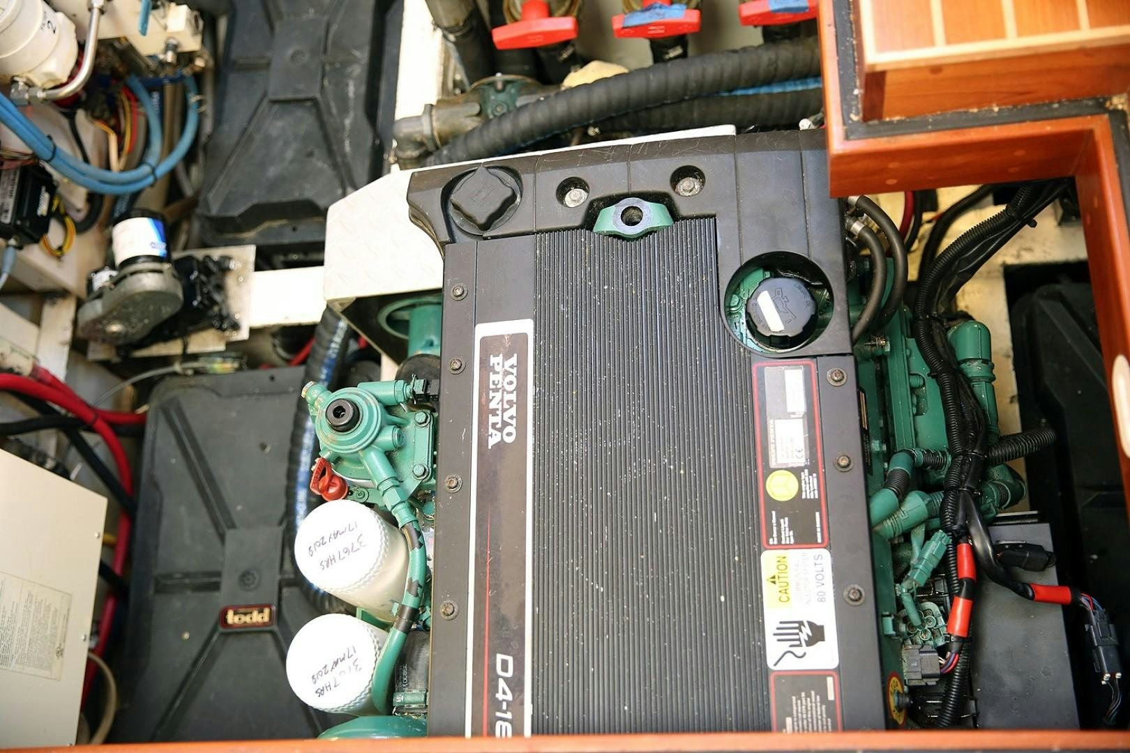 a close-up of a car engine aboard DANCIN BARE V Yacht for Sale