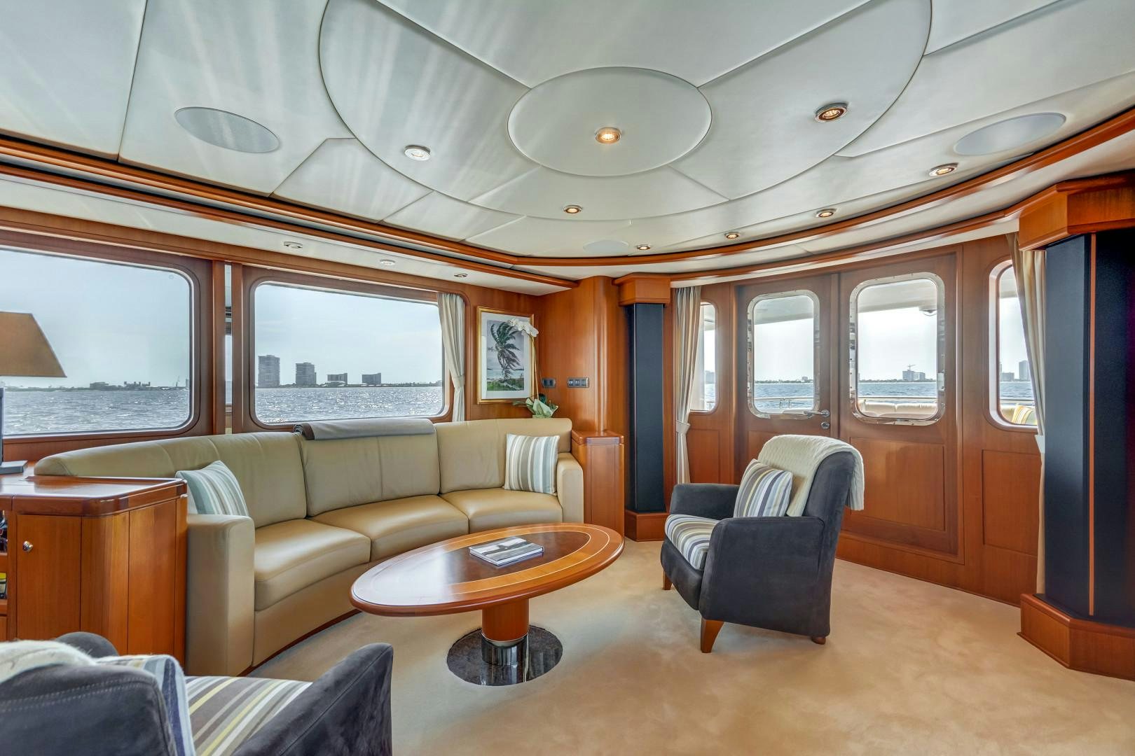 a living room with a large ceiling aboard GUSTO Yacht for Sale