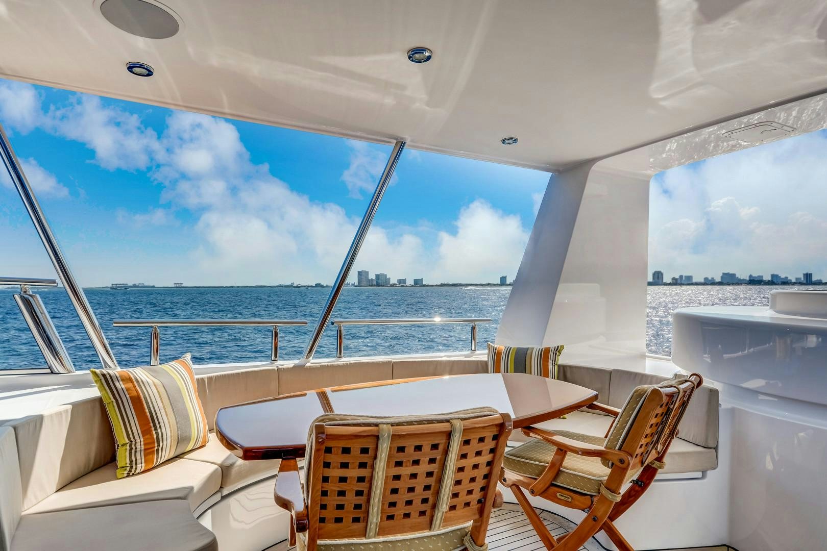 a room with a view of the ocean and the ocean aboard GUSTO Yacht for Sale